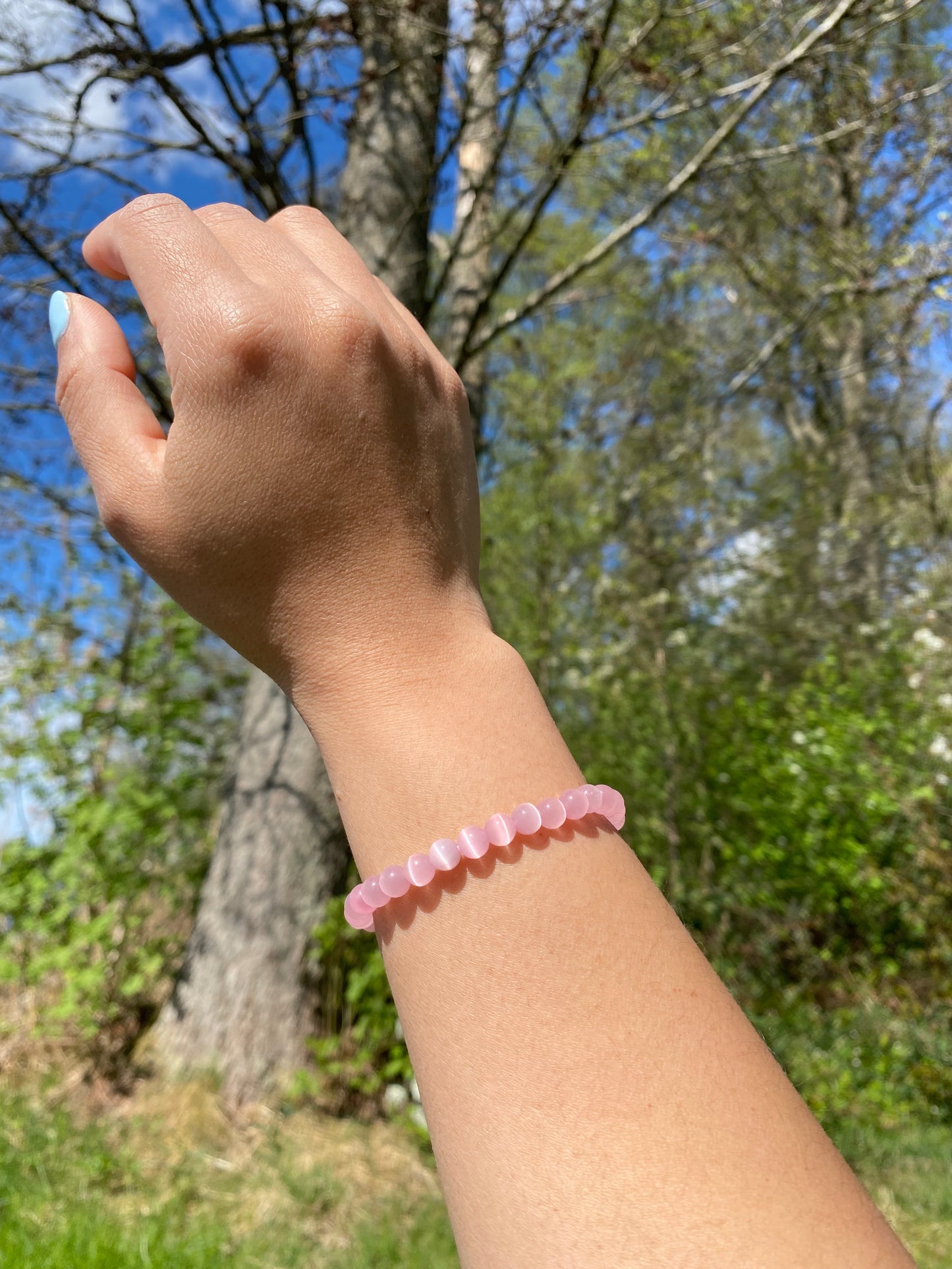 Mörkrosa kattögonsten armband
