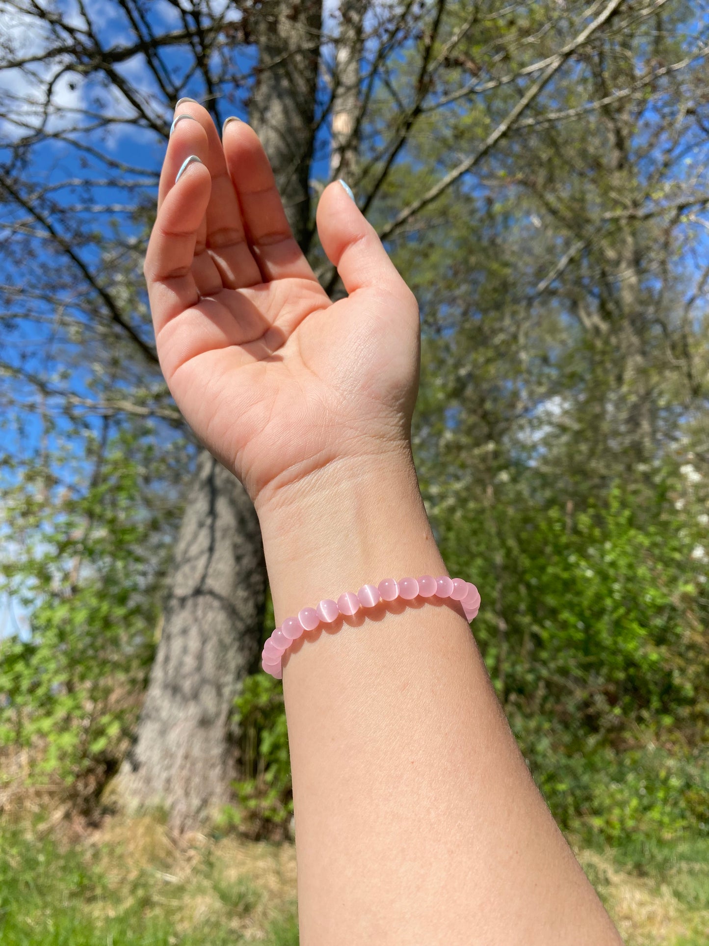 Mörkrosa kattögonsten armband